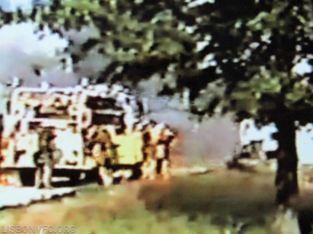 A blurry close up of the explosion. You can note some debris being carried in the cloud, which landed 50 yards+/- away.