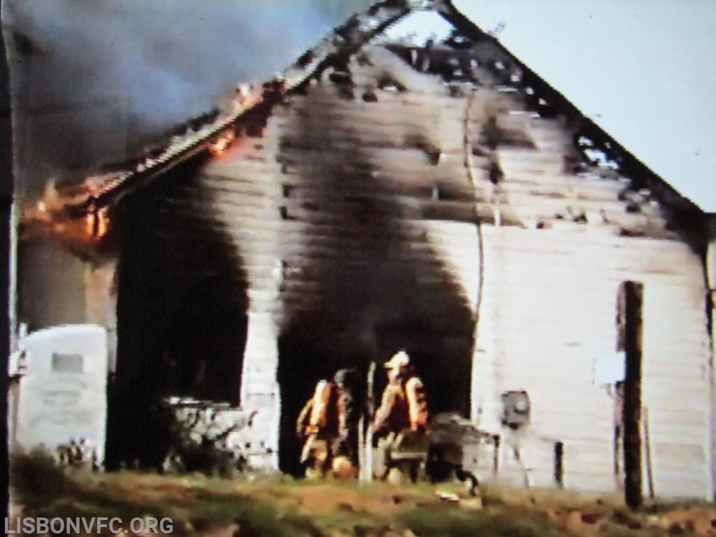 Fire is being knocked, doors and windows where the force of he explosion left the building. As it turned out the ONLY structure that was damaged was this building. Actually quite a bit of the structure was left standing. All the other high risk exposures suffered NO damage.